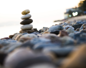 Stack of pebbles on beach.